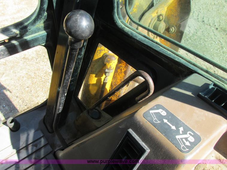 image for item L4049 1991 John Deere 310D backhoe