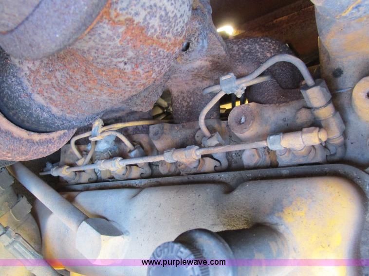 image for item L4049 1991 John Deere 310D backhoe