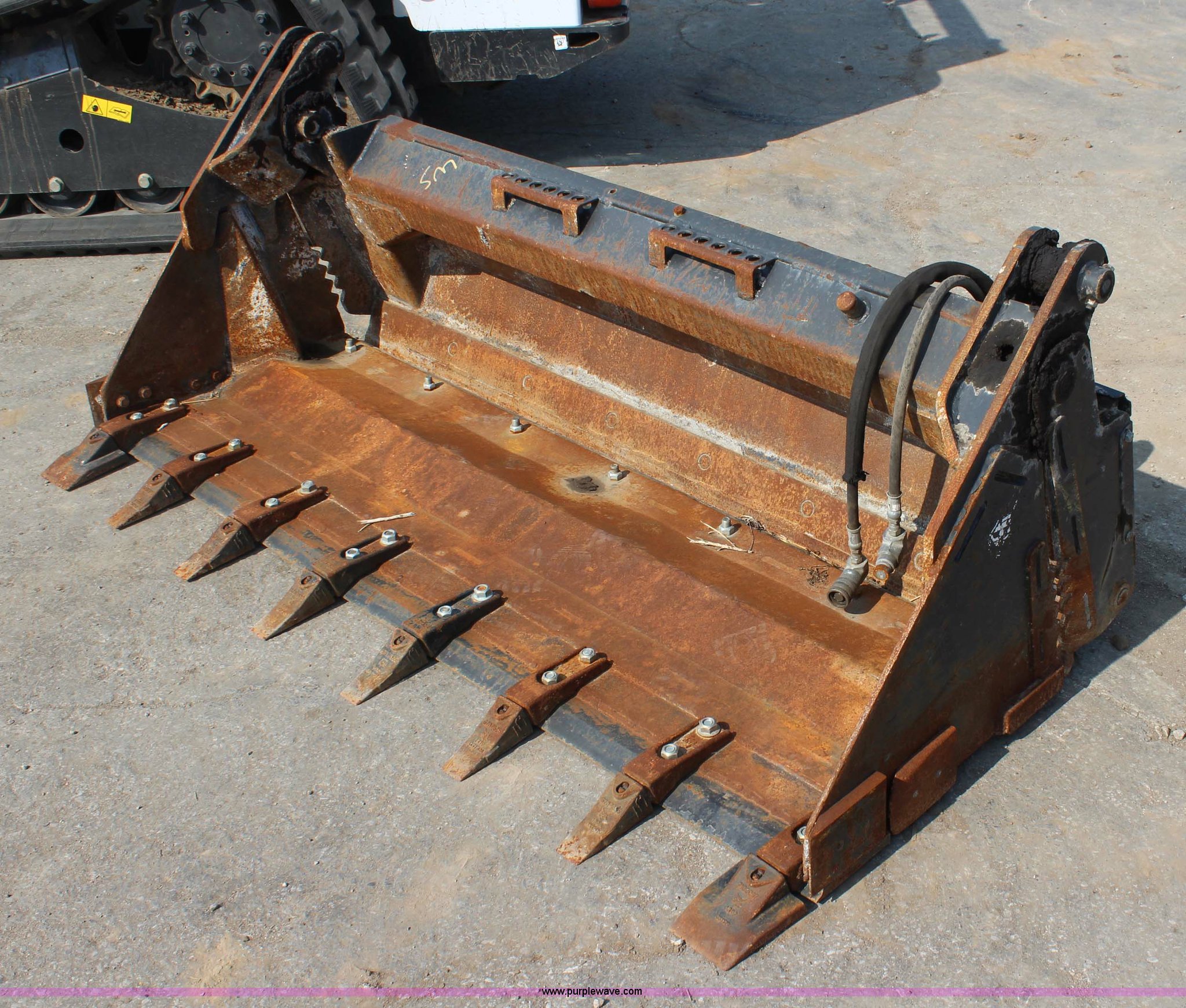 2011 Bobcat combination bucket in Topeka, KS Item J3668 sold Purple