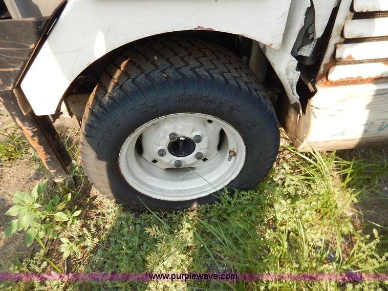 image for item L6250 2000 Tennant ATLV ride-on sweeper