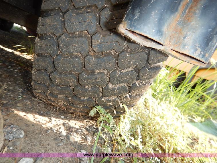 image for item L6250 2000 Tennant ATLV ride-on sweeper