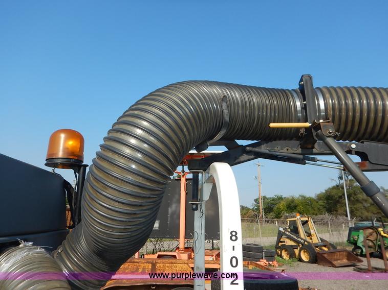 image for item L6250 2000 Tennant ATLV ride-on sweeper