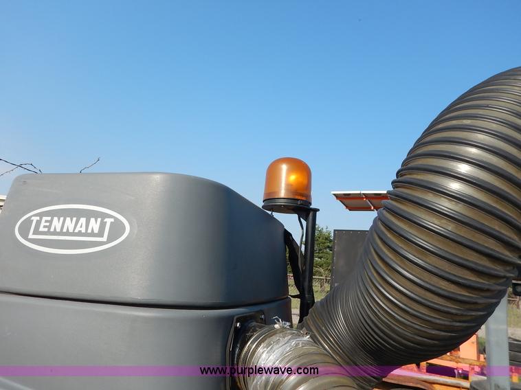 image for item L6250 2000 Tennant ATLV ride-on sweeper