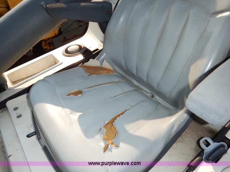 image for item L6250 2000 Tennant ATLV ride-on sweeper