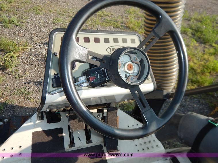 image for item L6250 2000 Tennant ATLV ride-on sweeper