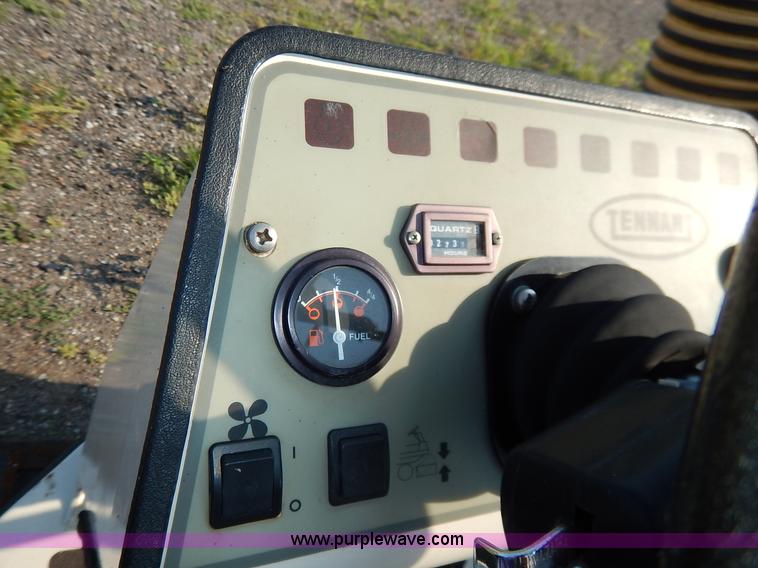 image for item L6250 2000 Tennant ATLV ride-on sweeper