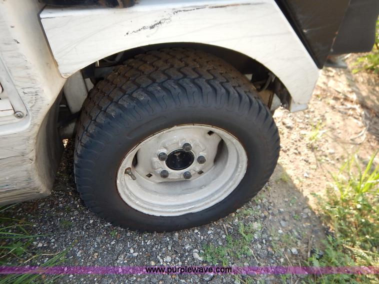 image for item L6250 2000 Tennant ATLV ride-on sweeper