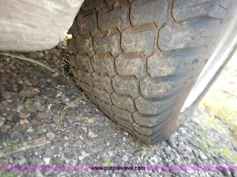 image for item L6250 2000 Tennant ATLV ride-on sweeper