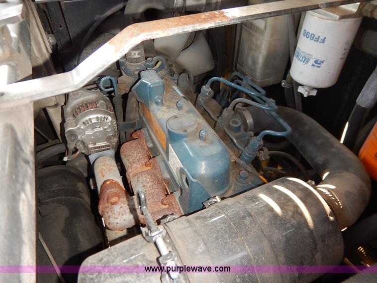 image for item L6250 2000 Tennant ATLV ride-on sweeper