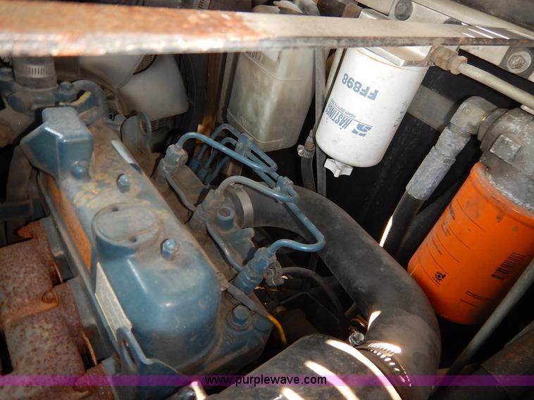 image for item L6250 2000 Tennant ATLV ride-on sweeper