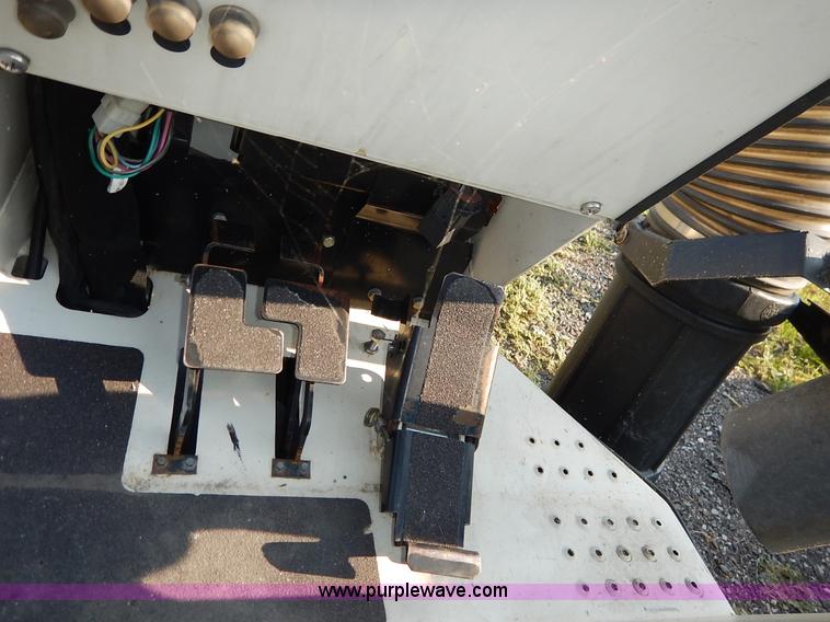 image for item L6250 2000 Tennant ATLV ride-on sweeper