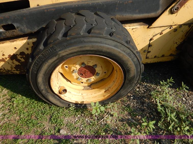 image for item L6252 New Holland L555 skid steer