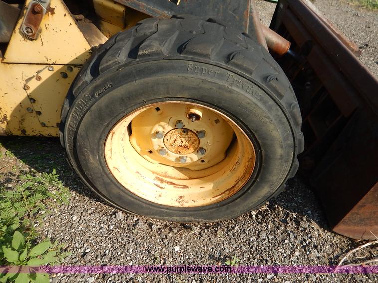 image for item L6252 New Holland L555 skid steer