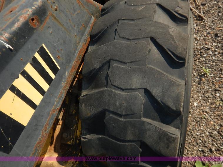 image for item L6252 New Holland L555 skid steer