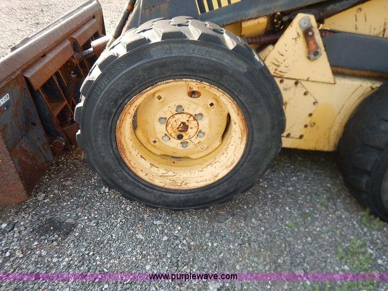 image for item L6252 New Holland L555 skid steer
