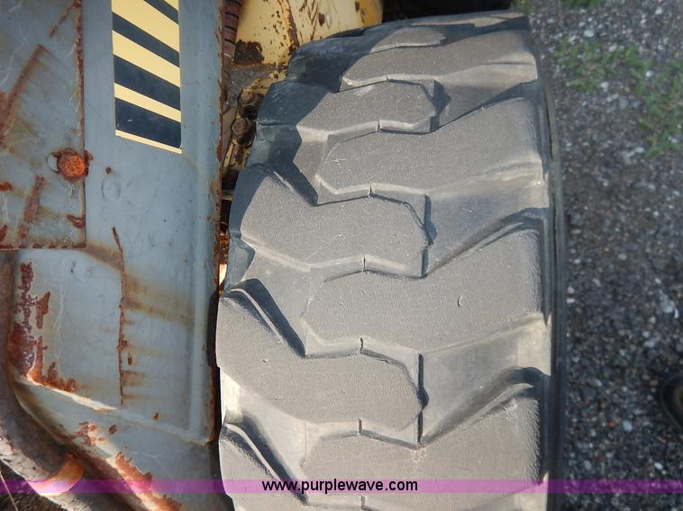 image for item L6252 New Holland L555 skid steer