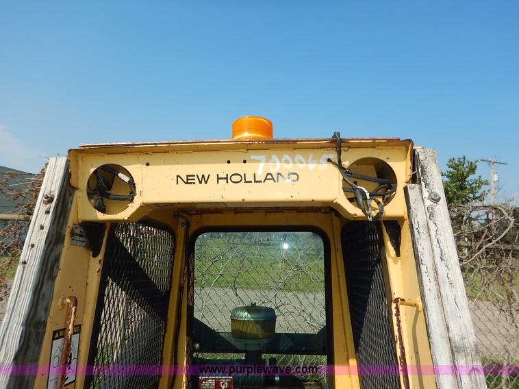 image for item L6252 New Holland L555 skid steer