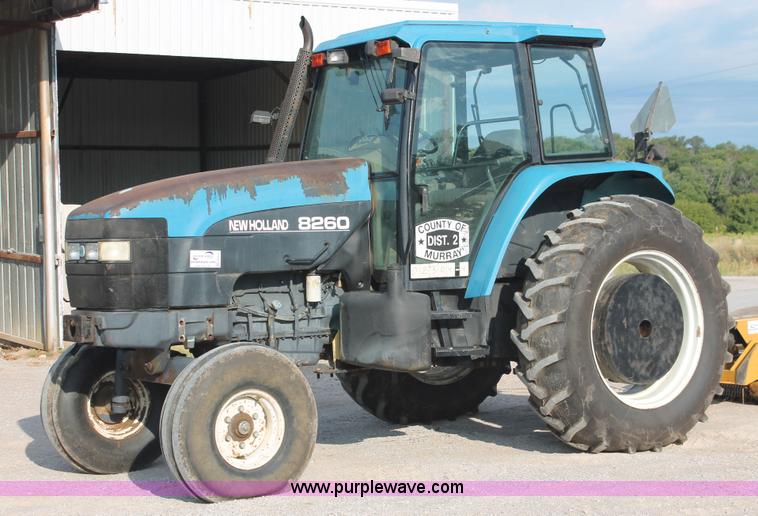 image for item H8121 1999 New Holland 8260 tractor