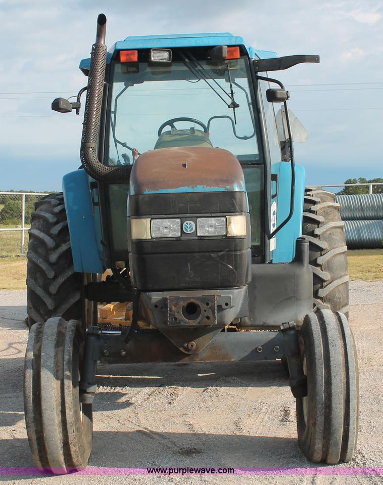 image for item H8121 1999 New Holland 8260 tractor
