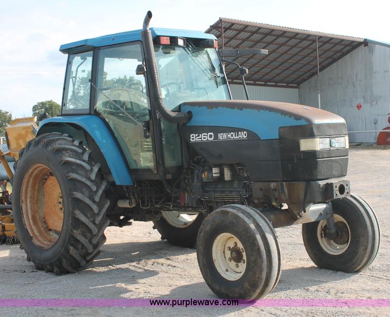 image for item H8121 1999 New Holland 8260 tractor