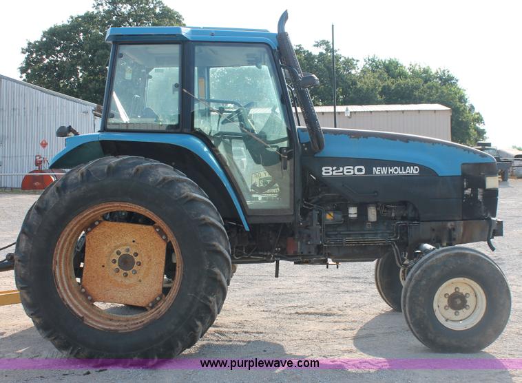 image for item H8121 1999 New Holland 8260 tractor