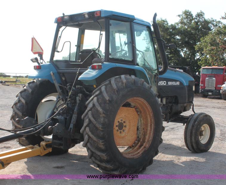 image for item H8121 1999 New Holland 8260 tractor
