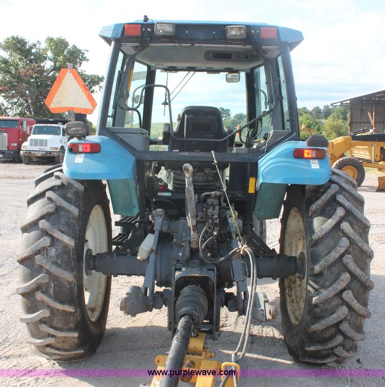image for item H8121 1999 New Holland 8260 tractor