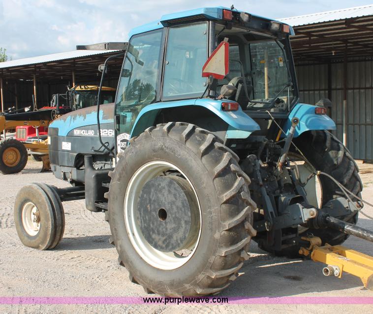 image for item H8121 1999 New Holland 8260 tractor