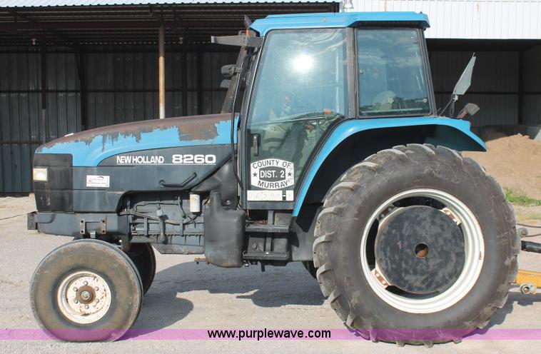 image for item H8121 1999 New Holland 8260 tractor