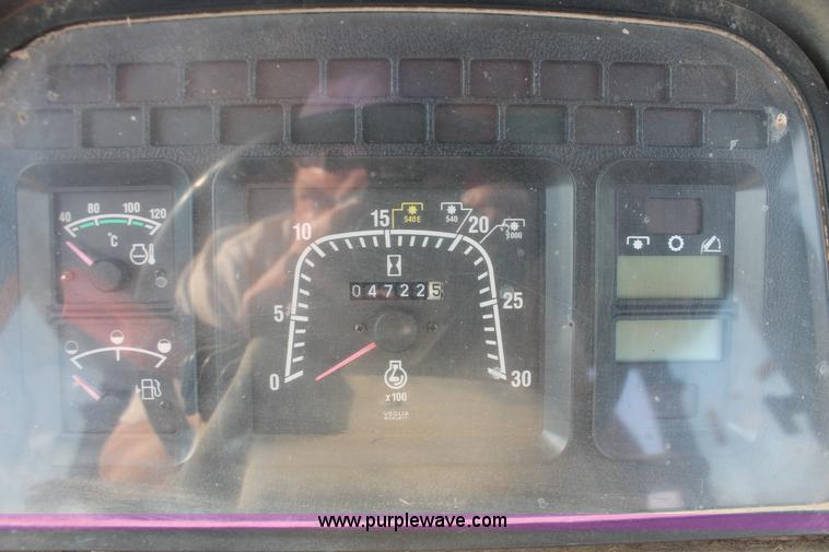 image for item H8121 1999 New Holland 8260 tractor