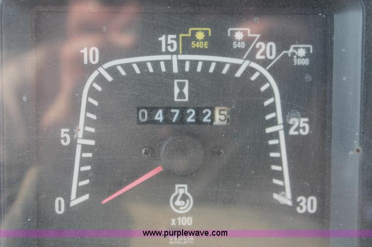 image for item H8121 1999 New Holland 8260 tractor