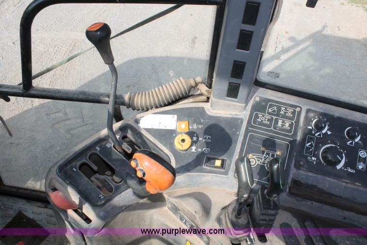 image for item H8121 1999 New Holland 8260 tractor