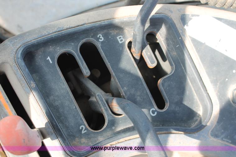 image for item H8121 1999 New Holland 8260 tractor