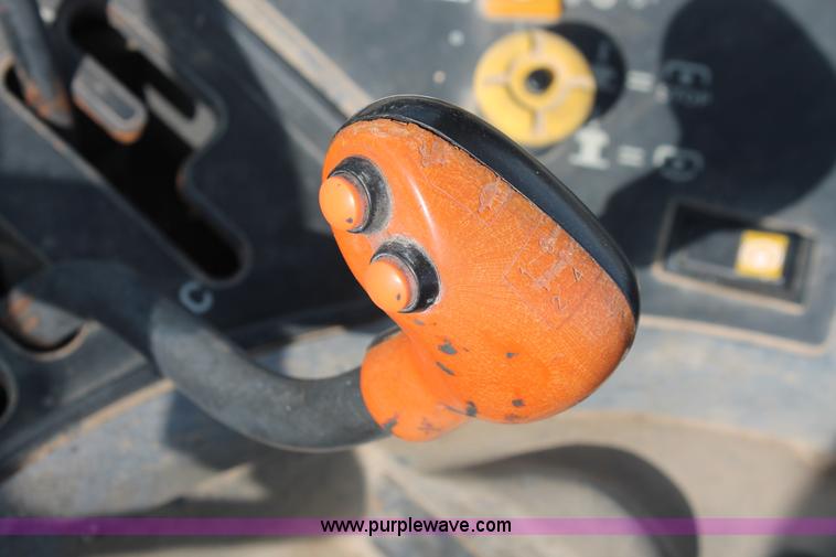 image for item H8121 1999 New Holland 8260 tractor