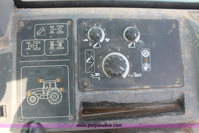 image for item H8121 1999 New Holland 8260 tractor