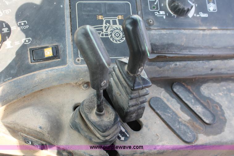 image for item H8121 1999 New Holland 8260 tractor