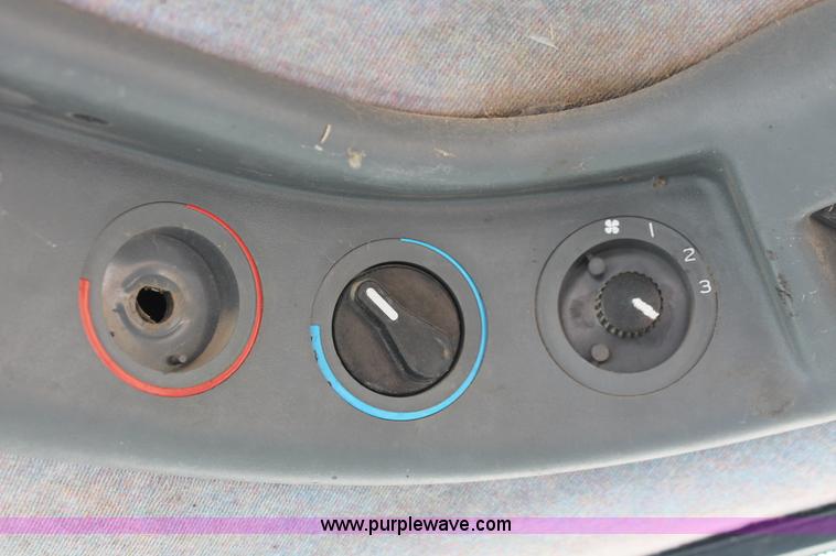 image for item H8121 1999 New Holland 8260 tractor