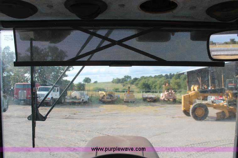 image for item H8121 1999 New Holland 8260 tractor