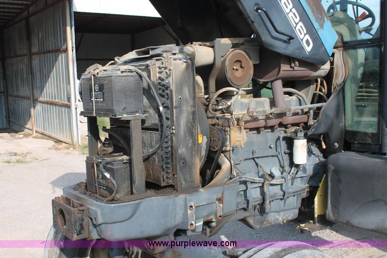 image for item H8121 1999 New Holland 8260 tractor