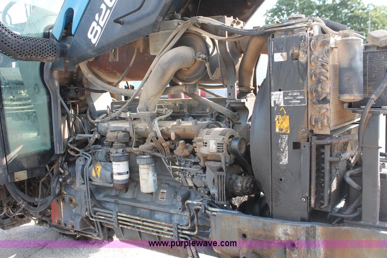 image for item H8121 1999 New Holland 8260 tractor