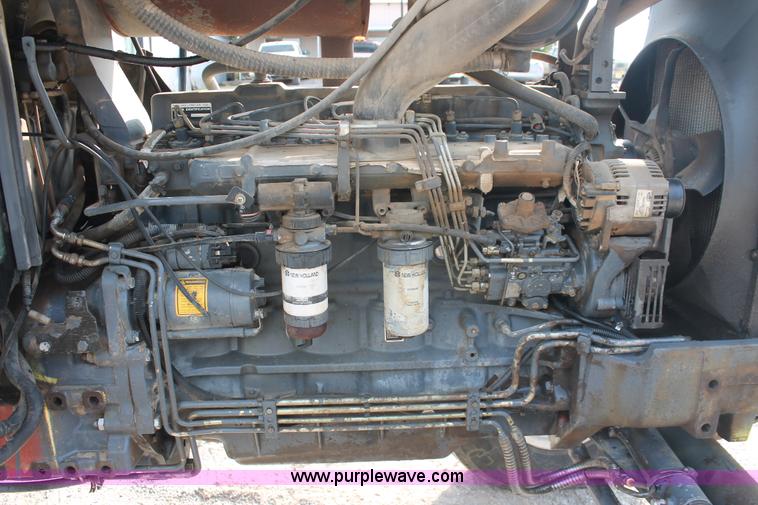 image for item H8121 1999 New Holland 8260 tractor