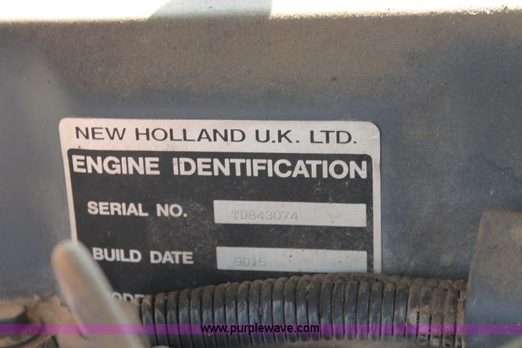image for item H8121 1999 New Holland 8260 tractor