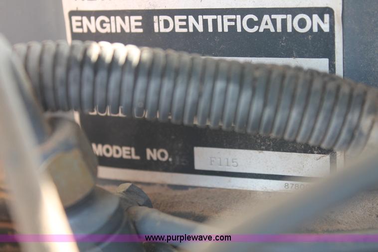 image for item H8121 1999 New Holland 8260 tractor