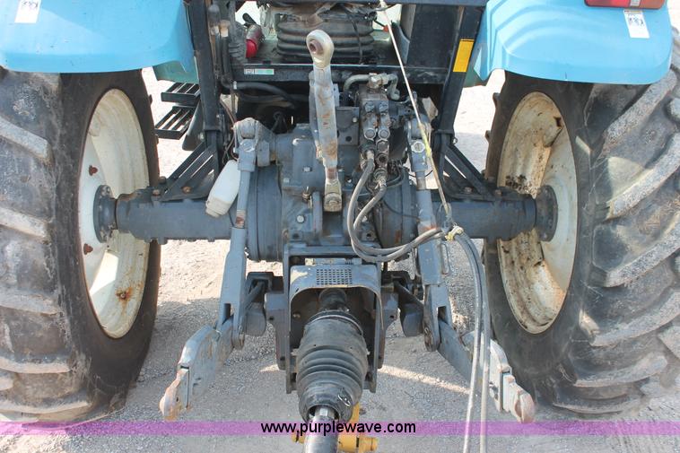image for item H8121 1999 New Holland 8260 tractor