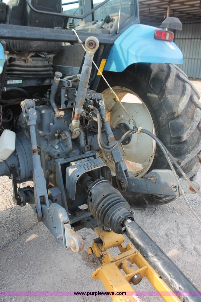 image for item H8121 1999 New Holland 8260 tractor