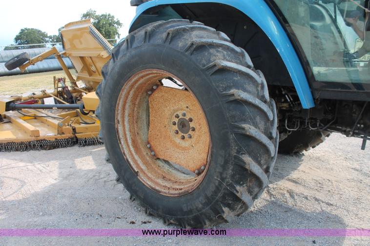image for item H8121 1999 New Holland 8260 tractor