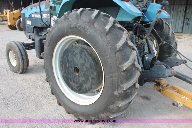 image for item H8121 1999 New Holland 8260 tractor