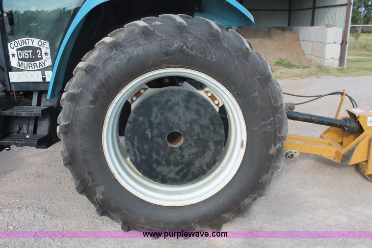 image for item H8121 1999 New Holland 8260 tractor