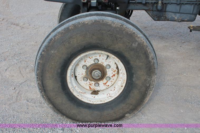 image for item H8121 1999 New Holland 8260 tractor