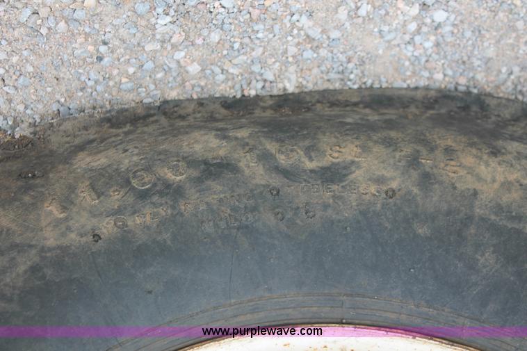 image for item H8121 1999 New Holland 8260 tractor